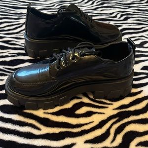 Black lugged sole loafers with laces